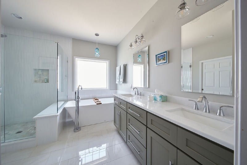 Brass sconces above bathroom vanity  Grey bathroom vanity, Bathroom  interior, Bathrooms remodel